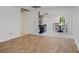 Open-concept living space with mixed flooring and kitchen island and breakfast nook at 263 Mountainview Cir, Canton, GA 30115