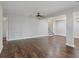 Spacious open-concept living room with hardwood floors and a staircase at 263 Mountainview Cir, Canton, GA 30115