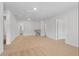 Large bonus room featuring neutral carpet, multiple doorways, and staircase at 342 Orwell Drive Lot 95, Social Circle, GA 30025