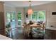 Charming breakfast nook with ample natural light and access to an outdoor deck at 5085 Johns Creek Ct, Johns Creek, GA 30022
