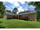 This house features a spacious backyard, a deck, and convenient access to outdoor living spaces at , Stockbridge, GA 30281