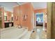Spacious bathroom featuring a soaking tub and walk-in shower, with bedroom access at , Stockbridge, GA 30281
