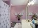 Functional bathroom featuring modern fixtures, decorative mirror and good natural light at , Stockbridge, GA 30281