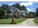 Charming brick home with a well-manicured lawn and mature trees in a peaceful setting at , Stockbridge, GA 30281