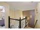 Hallway featuring stairs, railing and access to other rooms of the home at , Stockbridge, GA 30281