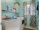Functional laundry room featuring modern washer and dryer, plus cabinet storage at , Stockbridge, GA 30281