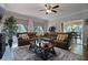 Spacious living room with a fireplace, ample seating, and lots of natural light at , Stockbridge, GA 30281