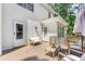 Inviting back deck with outdoor seating area for relaxing and entertaining on a sunny day at 3794 Brown Owl Ct, Marietta, GA 30062