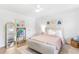 Bright bedroom featuring stylish decor, a comfortable bed, and ample closet space, ideal for restful nights at 3794 Brown Owl Ct, Marietta, GA 30062