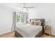 Serene bedroom with plush bedding, modern lighting, and scenic views, offering a peaceful and inviting space at 3794 Brown Owl Ct, Marietta, GA 30062