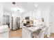 Bright kitchen with stainless steel appliances and granite countertops at 3794 Brown Owl Ct, Marietta, GA 30062