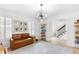 Bright playroom with comfortable seating and plenty of storage for toys and books at 3794 Brown Owl Ct, Marietta, GA 30062