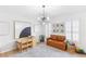 Charming playroom features modern art, a desk, and a stylish leather sofa at 3794 Brown Owl Ct, Marietta, GA 30062