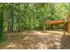 Spacious backyard with a covered patio, ideal for outdoor entertaining and relaxation at 800 Greenwood Se Trl, Conyers, GA 30094