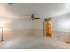 Bedroom featuring ceiling fan, natural light, and carpeted floors at 800 Greenwood Se Trl, Conyers, GA 30094