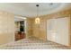 Dining area featuring checkered floors, closet and doorway to another room at 800 Greenwood Se Trl, Conyers, GA 30094