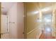 Well lit hallway with multiple doors leading to other rooms and stylish flooring at 800 Greenwood Se Trl, Conyers, GA 30094