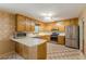 Kitchen includes stainless steel appliances, generous counter space and classic cabinetry at 800 Greenwood Se Trl, Conyers, GA 30094