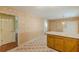Spacious kitchen with center island, checkered floors and access to the living room and dining room at 800 Greenwood Se Trl, Conyers, GA 30094