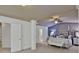 Spacious bedroom with an ensuite bathroom, decorative pillars, and a comfortable bed at 2626 Sardis Chase Ct, Buford, GA 30519