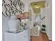 Welcoming foyer with stylish decor, arched doorways and elegant hardwood floors at 2626 Sardis Chase Ct, Buford, GA 30519