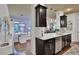 Bright, open kitchen with a breakfast bar, sleek countertops, and modern appliances at 2626 Sardis Chase Ct, Buford, GA 30519