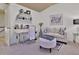 Stylish sitting room with a neutral color palette, accented with blue decor at 2626 Sardis Chase Ct, Buford, GA 30519