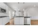 Modern kitchen featuring stainless steel appliances, island with pendant lighting at 271 Orwell Dr, Social Circle, GA 30025