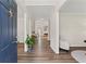Inviting foyer with hardwood floors, offering a glimpse into the spacious living areas at 479 Rising Sun Path, Lawrenceville, GA 30043