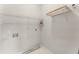 Laundry room with shelving, connections for a washer and dryer, and neutral flooring at 479 Rising Sun Path, Lawrenceville, GA 30043