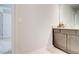 Bathroom featuring tiled floors, a granite vanity, and doorway views of the Primary bath at 774 Phil Haven Ln, Kennesaw, GA 30152