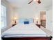 Comfortable bedroom with neutral carpet, two windows and ceiling fan at 774 Phil Haven Ln, Kennesaw, GA 30152