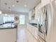 Modern kitchen features sleek countertops, stainless steel appliances, and ample natural light at 774 Phil Haven Ln, Kennesaw, GA 30152