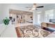 Open-concept living room seamlessly connects to the kitchen and dining area at 774 Phil Haven Ln, Kennesaw, GA 30152