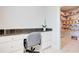 Convenient office nook with granite countertop near walk-in pantry for added convenience at 774 Phil Haven Ln, Kennesaw, GA 30152