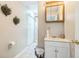 Practical bathroom with single vanity, medicine cabinet and neutral colors at 840 Milton Oaks Dr, Johns Creek, GA 30022