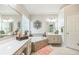 Relaxing bathroom with a whirlpool tub, double vanity and large windows at 840 Milton Oaks Dr, Johns Creek, GA 30022