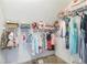 Walk-in closet with organized clothing racks and shelving at 840 Milton Oaks Dr, Johns Creek, GA 30022