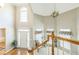 Grand foyer with high ceilings, hardwood floors, and large windows allowing for tons of natural light at 840 Milton Oaks Dr, Johns Creek, GA 30022