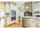Bright kitchen features stainless steel appliances, lots of cabinet space, and stone countertops at 840 Milton Oaks Dr, Johns Creek, GA 30022