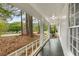 View from front porch features a meticulously maintained landscape with mature trees and shrubs at 2694 Hickory Valley Dr, Snellville, GA 30078