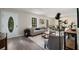 Open-concept living area with hardwood floors, neutral colors, and an inviting atmosphere at 2694 Hickory Valley Dr, Snellville, GA 30078