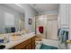Bathroom with shower and single sink at 3264 Salem Cove Se Trl, Conyers, GA 30013