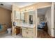 Bathroom with a large mirror, toilet, and access to bedroom at 3264 Salem Cove Se Trl, Conyers, GA 30013