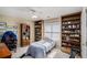 Bedroom featuring built in shelving and desk space at 3264 Salem Cove Se Trl, Conyers, GA 30013