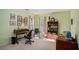 Comfortable home office with a desk and shelving at 3264 Salem Cove Se Trl, Conyers, GA 30013