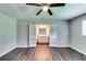 Bedroom with closet space and ensuite bathroom, ceiling fan, and neutral paint at 4342 Riverwood Cir, Decatur, GA 30035