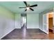 Bright, neutral main bedroom featuring ceiling fan and adjoining closets at 4342 Riverwood Cir, Decatur, GA 30035