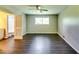 Spacious main bedroom featuring natural light and access to the en-suite bathroom at 4342 Riverwood Cir, Decatur, GA 30035