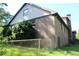 Angled side and back view of a brick house with metal roof at 5225 Kings Hwy, Douglasville, GA 30135